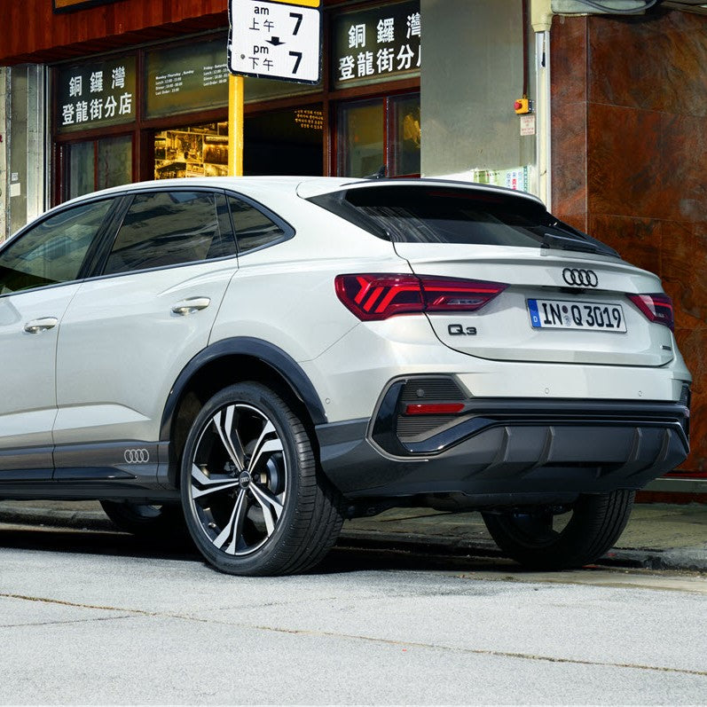 Audi rings, rear. Black, Q3 Sportback