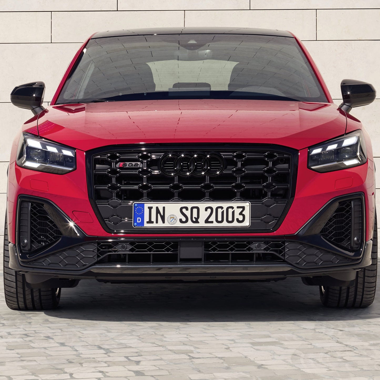 SQ2 Model name, front. Black,